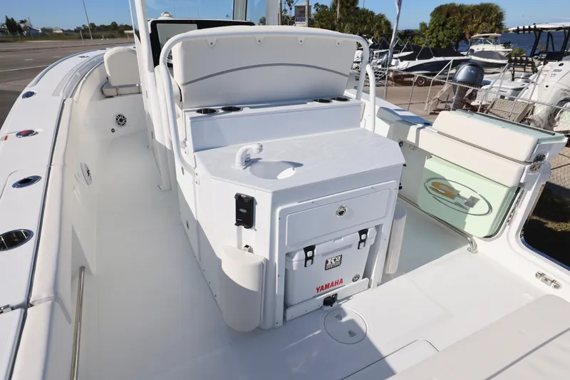 Slide: The Image of 2026 Sea Hunt Ultra 275 SE boat interior with seating and storage features. - 6