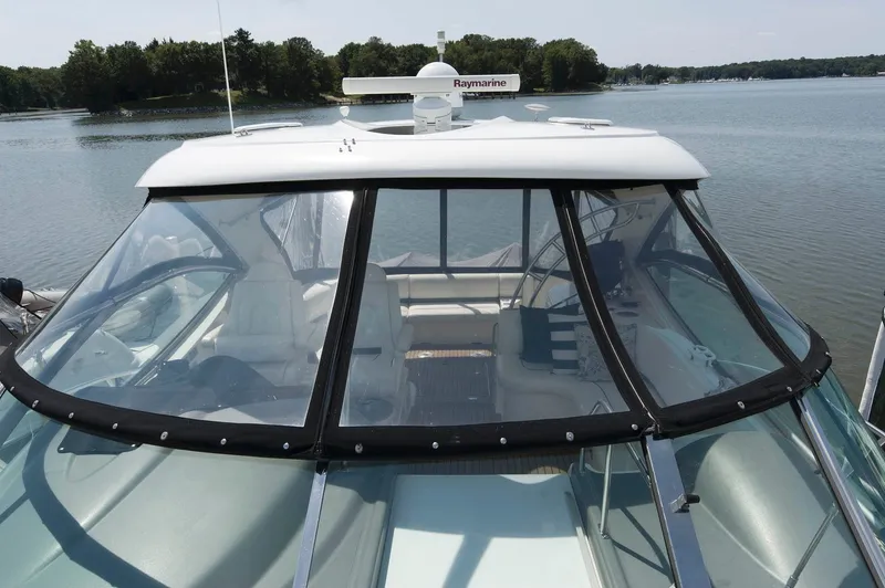 Slide: The Image of 2005 Cruisers Yachts 520 Express on calm water. - 17