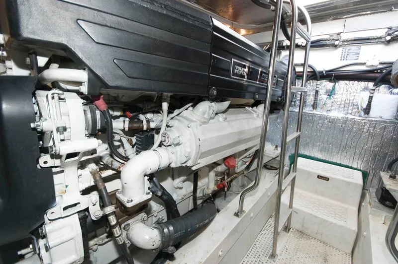 Slide: The Image of Engine room of 2005 Cruisers Yachts 520 Express. - 34