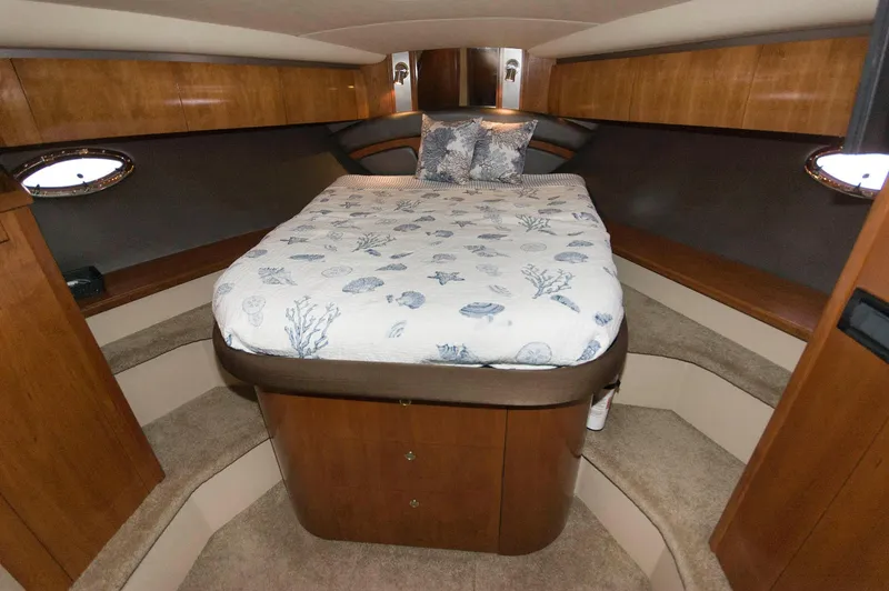 Slide: The Image of Luxurious bedroom in a 2005 Cruisers Yachts 520 Express. - 31