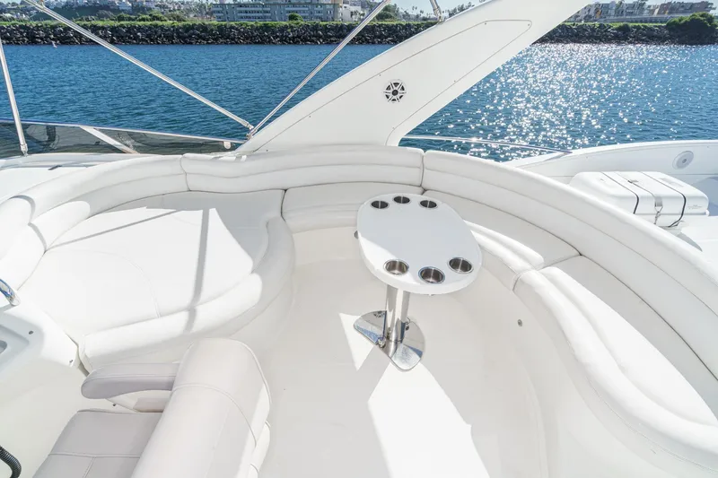 Slide: The Image of Luxurious seating area on a 2002 Azimut 58 yacht with ocean view. - 19