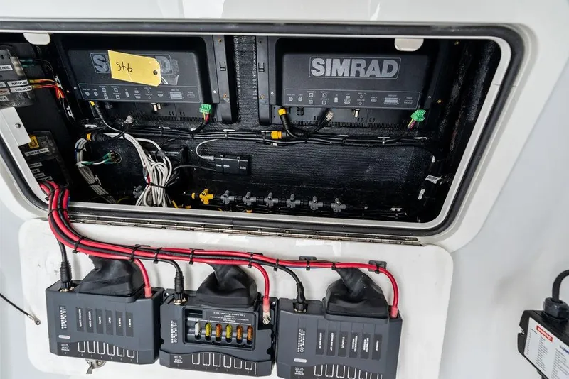 Slide: The Image of Electrical panel of 2021 Yellowfin 36 Offshore boat with Simrad equipment. - 23