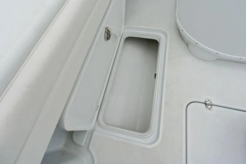 Slide: The Image of Open storage compartment on 2021 Yellowfin 36 Offshore boat deck. - 34
