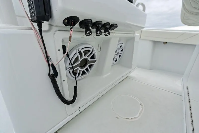 Slide: The Image of 2021 Yellowfin 36 Offshore boat interior with speakers and control panel. - 36