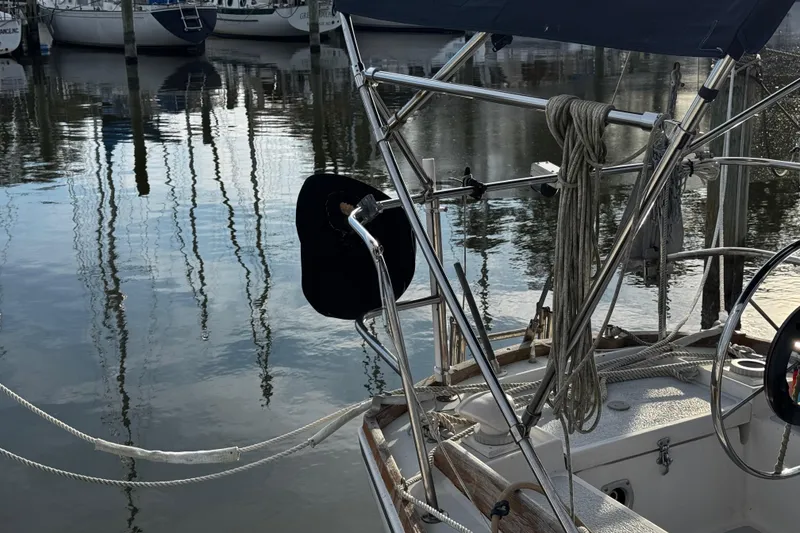 Slide: The Image of 1977 Bristol 29.9 sailboat featuring a grill on the stern rail - 11