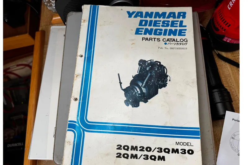 Slide: The Image of Yanmar diesel engine parts catalog on a table, Bristol 29.9, 1977 model. - 26