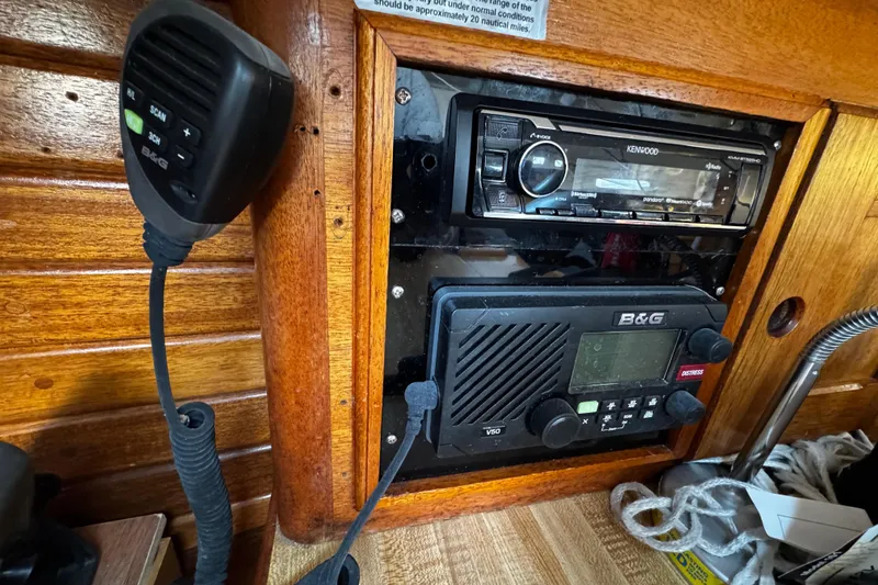 Slide: The Image of 1977 Bristol 29.9 yacht radio and navigation equipment with Kenwood stereo and B&G V50 system. - 30