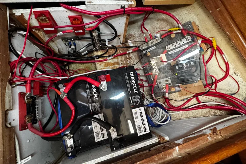 Slide: The Image of Electrical system of a 1977 Bristol 29.9 boat with batteries and wiring. - 40