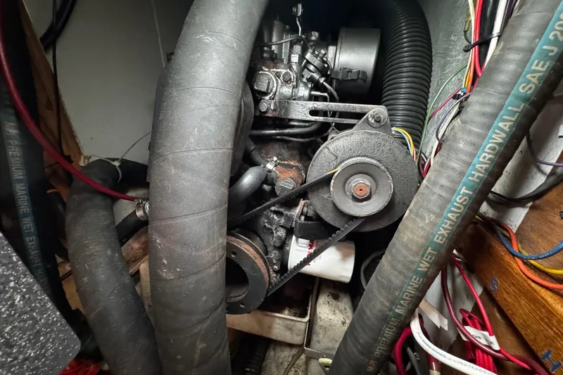 Slide: The Image of 1977 Bristol 29.9 engine compartment with visible hoses and mechanical components. - 41