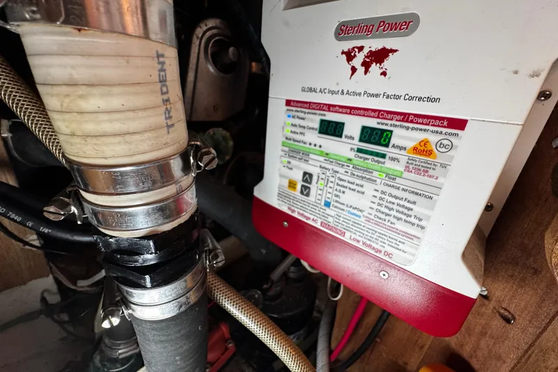 Slide: The Image of Sterling Power charger in 1977 Bristol 29.9, featuring Trident hose and clamps. - 42