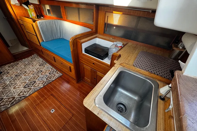Slide: The Image of galley with room to cook meals, portable stovetop, sink - 47