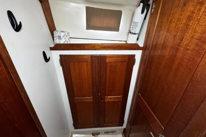 Slide: The Image of storage across from the head right before the vberth - 56