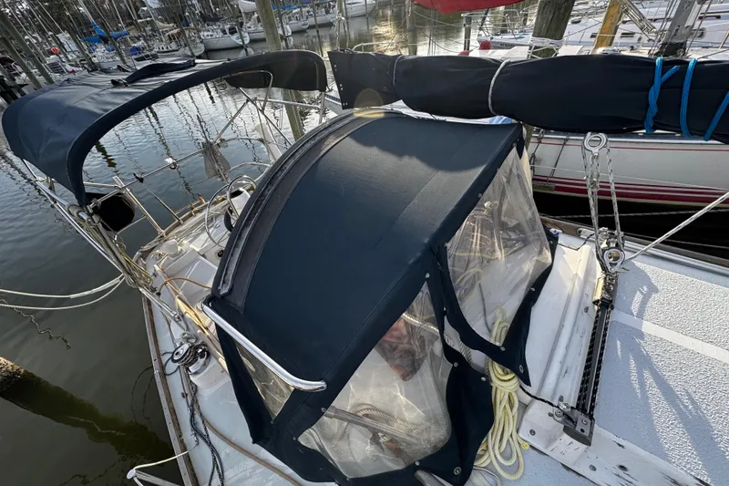 Slide: The Image of 1977 Bristol 29.9 sailboat with blue canvas bimini and dodger - 9