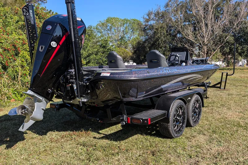Slide: The Image of 2026 Falcon F20 PREDATOR boat on trailer, featuring sleek design and powerful engine. - 10