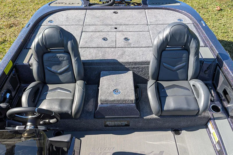 Slide: The Image of 2026 Falcon F20 PREDATOR boat interior with dual leather seats and steering wheel. - 16