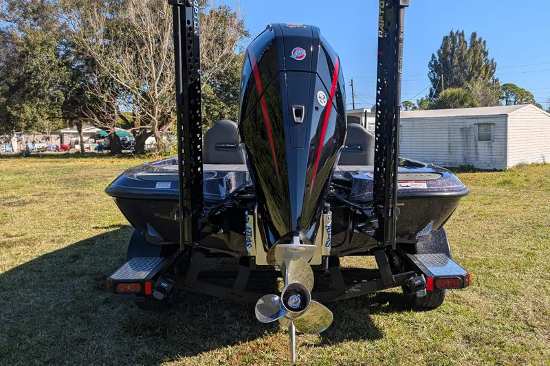 Slide: The Image of Rear view of 2026 Falcon F20 PREDATOR boat with powerful outboard motor. - 11