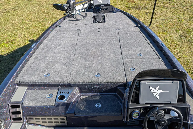 Slide: The Image of 2026 Falcon F20 PREDATOR boat interior with advanced dashboard and spacious deck. - 14