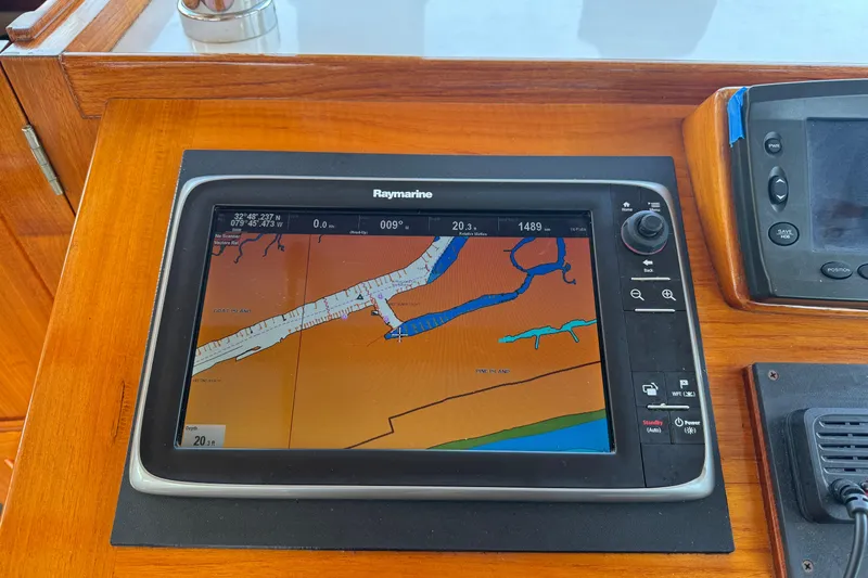 Slide: The Image of Raymarine navigation display on 2001 Ellis 36 Flybridge boat, showing nautical chart. - 29
