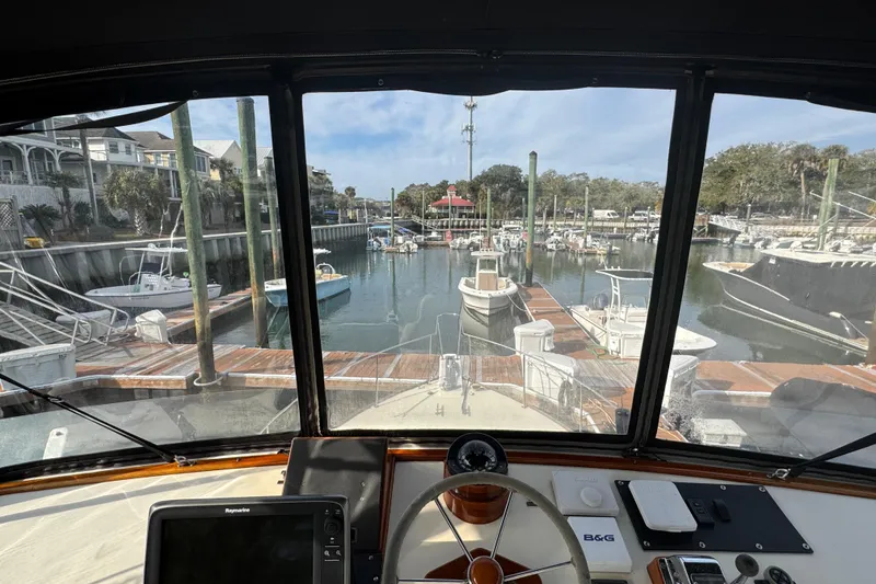 Slide: The Image of View from Ellis 36 Flybridge 2001, overlooking marina with boats and docks. - 40