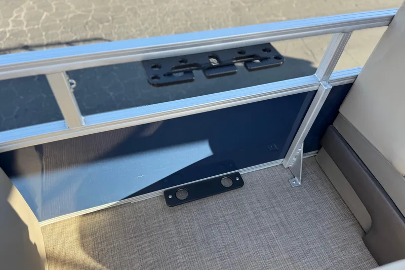 Slide: The Image of Interior view of 2022 Sun Tracker Fishin' Barge 22 DLX pontoon boat railing and flooring. - 16