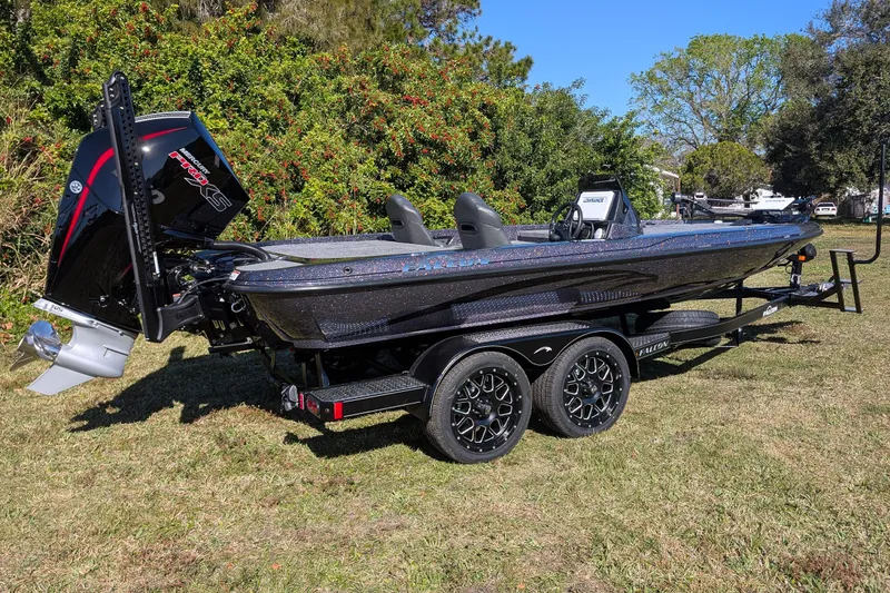 The Image of 2026 Falcon F20 PREDATOR boat on trailer, featuring sleek design and powerful engine. - 0