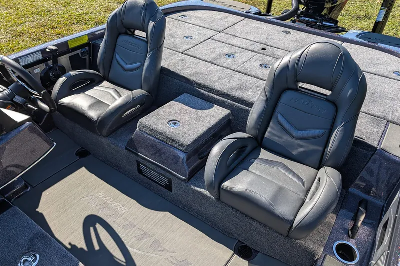 Slide: The Image of Interior of 2026 Falcon F20 PREDATOR boat with two black leather seats. - 19