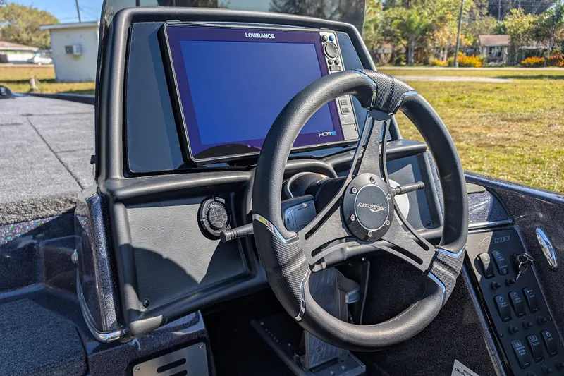 Slide: The Image of Steering console of 2026 Falcon F20 PREDATOR boat with Lowrance HDS12 display. - 20