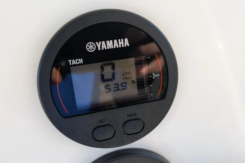 Slide: The Image of Yamaha tachometer on 2016 Key West 219 FS boat, displaying 53.9 hours. - 14
