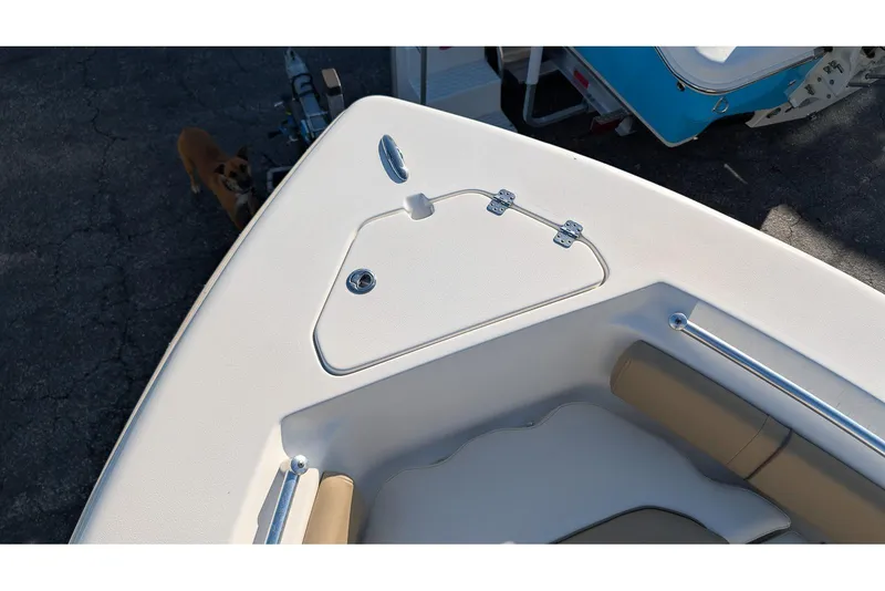Slide: The Image of 2016 Key West 219 FS boat deck with storage compartment and seating. - 19