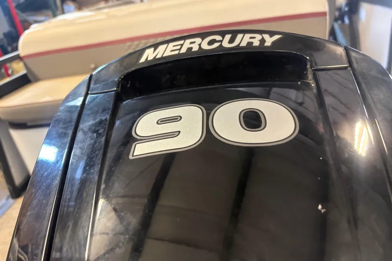 Slide: The Image of Mercury 90 horsepower engine on 2023 Qwest Lanai 820 boat. - 5