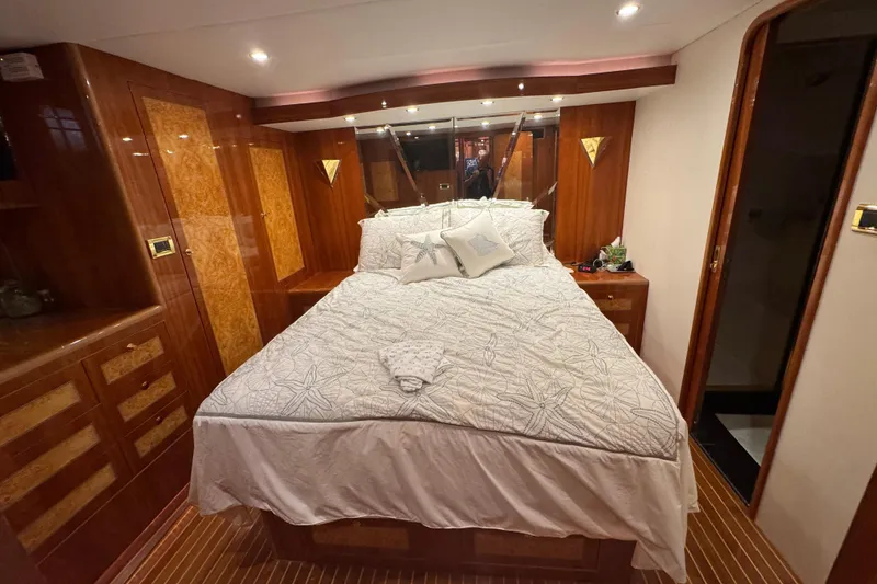 Slide: The Image of Luxurious bathroom in 2003 Altima 55 Pilothouse yacht with elegant fixtures and amenities. - 42