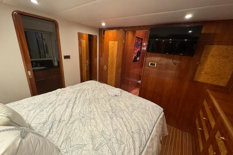 Slide: The Image of Luxurious bathroom in 2003 Altima 55 Pilothouse yacht with elegant sink and toilet. - 44