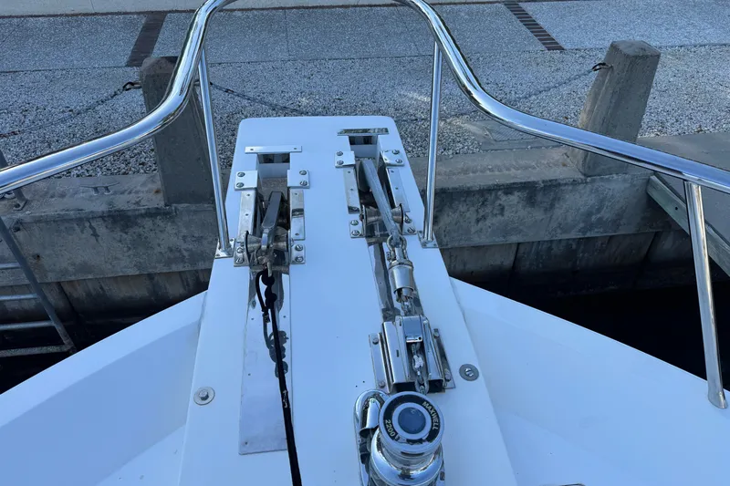 Slide: The Image of 2003 Altima 55 Pilothouse boat deck with railing and winch system. - 5