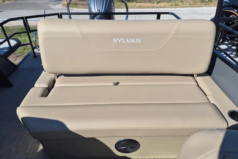 Slide: The Image of 2026 Sylvan MIRAGE 822 CLZ DH boat seat with beige upholstery and logo. - 10
