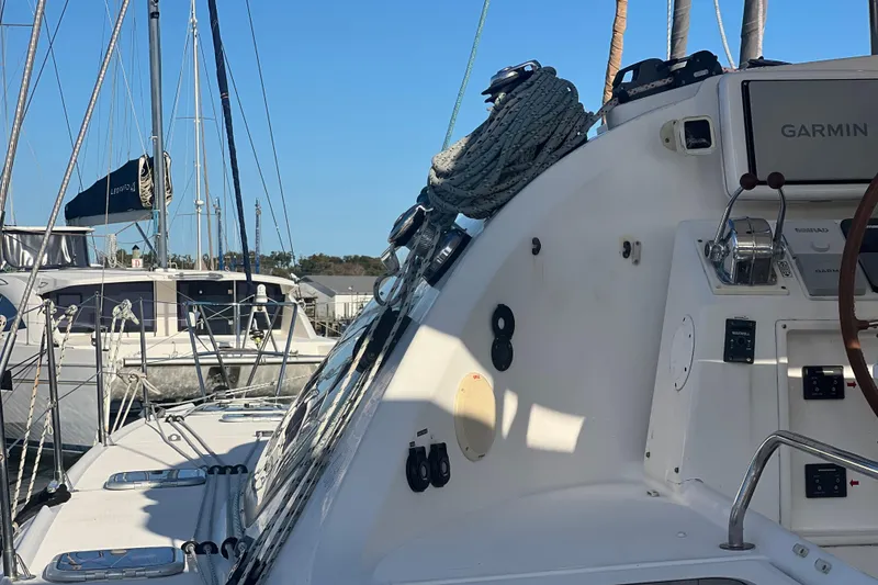 Slide: The Image of Sailboat cockpit with ropes and Garmin equipment, Privilege 495, 2011 model. - 13