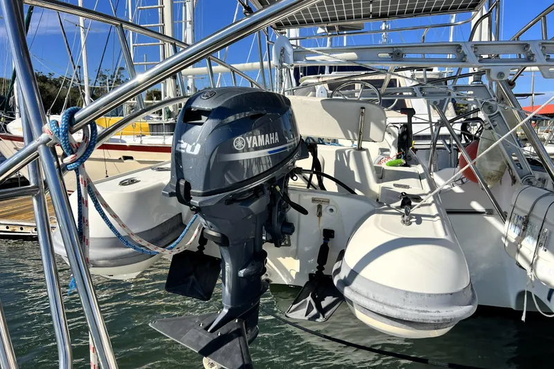 Slide: The Image of Yamaha outboard motor on 2011 Privilege 495 catamaran, docked at marina. - 15