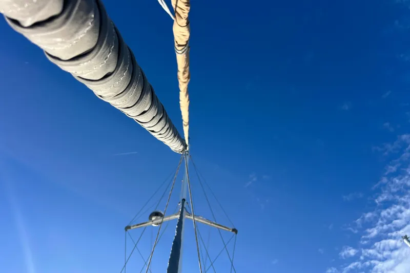 Slide: The Image of Sailboat mast and rigging against clear blue sky, Privilege 495, 2011 model. - 21
