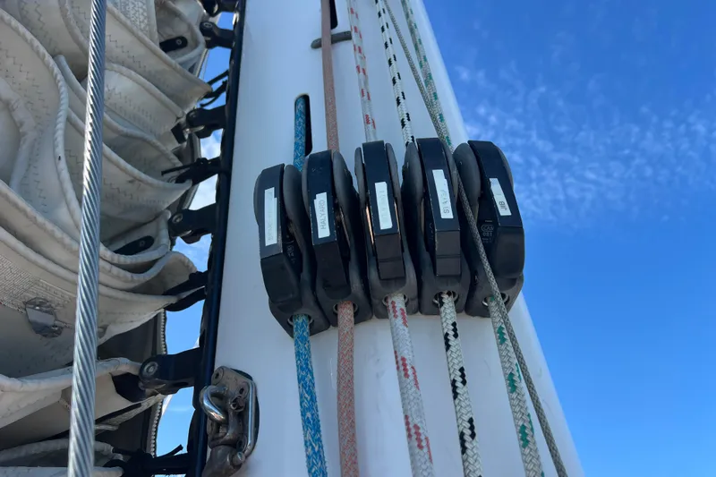 Slide: The Image of Sailing rigging on Privilege 495 yacht, 2011 model, against a clear blue sky. - 28