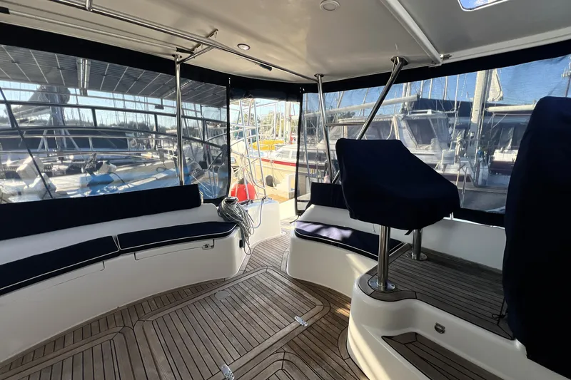 Slide: The Image of Interior view of 2011 Privilege 495 yacht with seating and wooden flooring. - 40