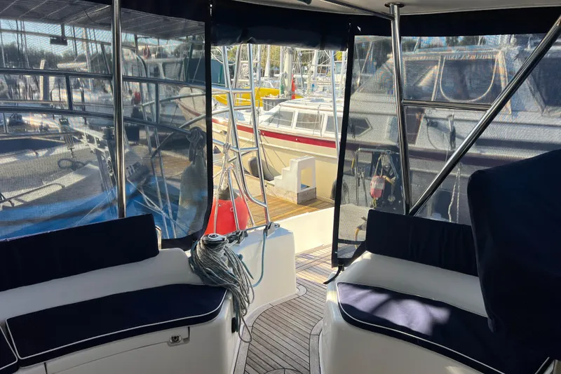 Slide: The Image of Interior view of 2011 Privilege 495 yacht with marina backdrop. - 44