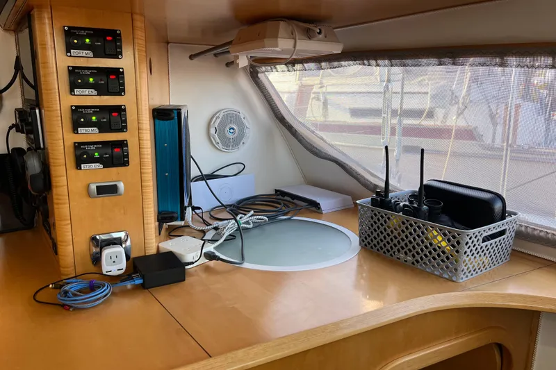 Slide: The Image of Control panel and equipment inside a 2011 Privilege 495 yacht cabin. - 55