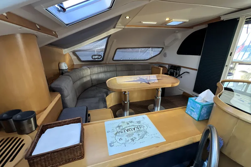 Slide: The Image of Luxurious interior of 2011 Privilege 495 yacht with cozy seating and elegant dining area. - 58