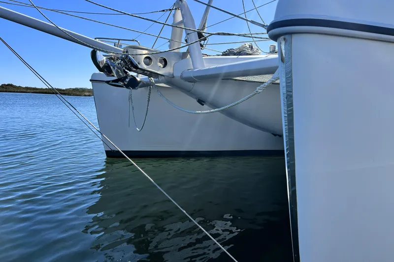 Slide: The Image of Sailing catamaran Privilege 495, 2011 model, anchored on calm water. - 6