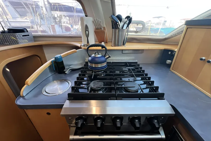 Slide: The Image of Modern kitchen in 2011 Privilege 495 yacht with stove and utensils. - 64