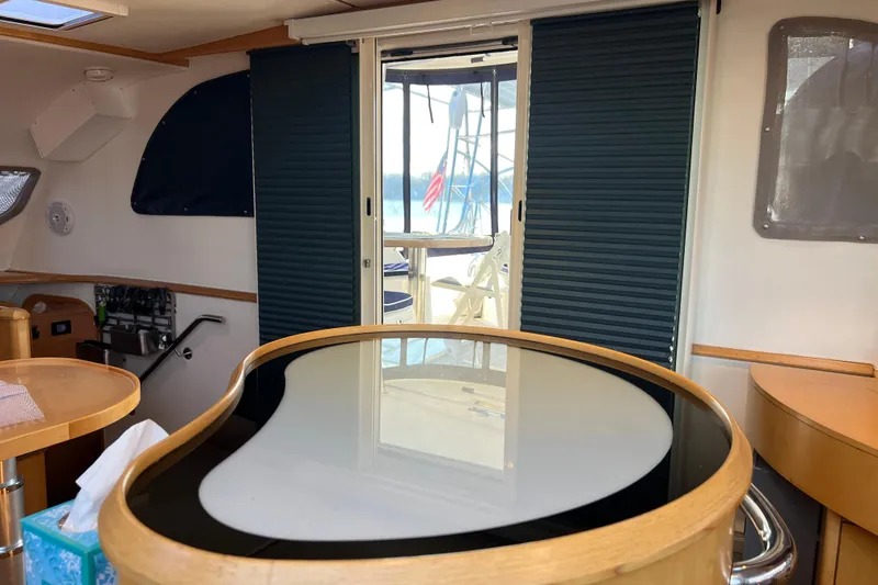 Slide: The Image of Interior of 2011 Privilege 495 yacht with modern furnishings and sliding door. - 66