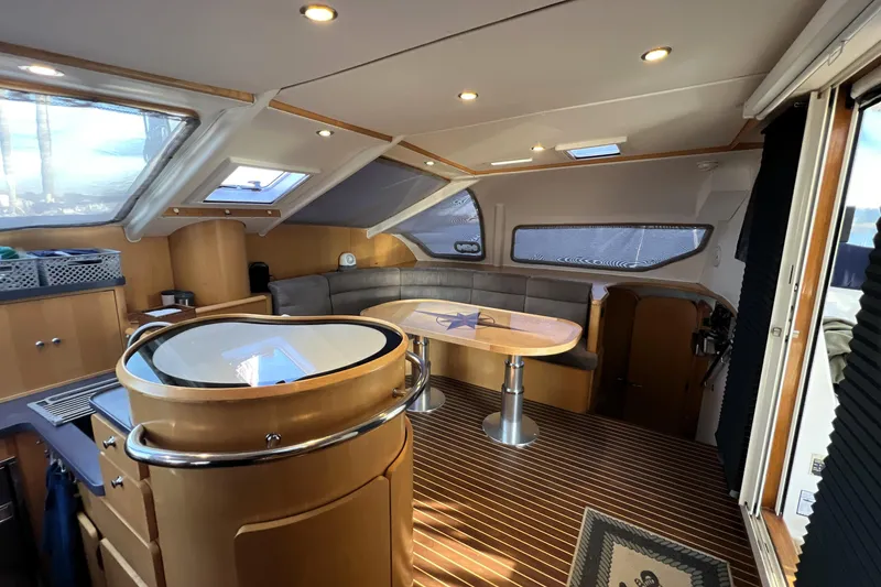 Slide: The Image of Luxurious interior of 2011 Privilege 495 yacht with modern furnishings and ample natural light. - 69