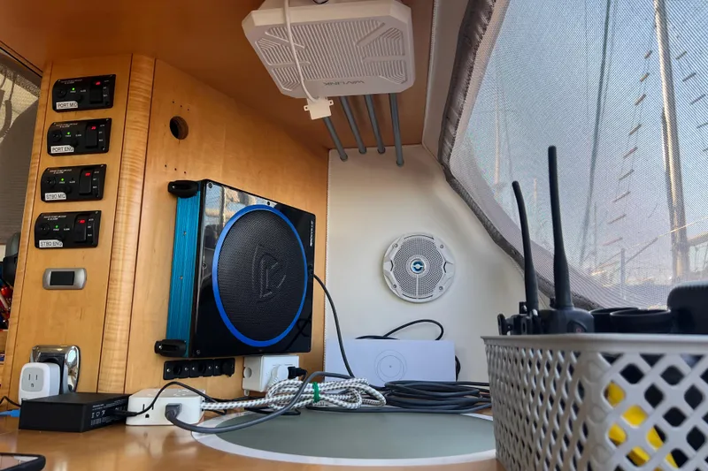 Slide: The Image of Control panel and electronics inside a 2011 Privilege 495 yacht cabin. - 70