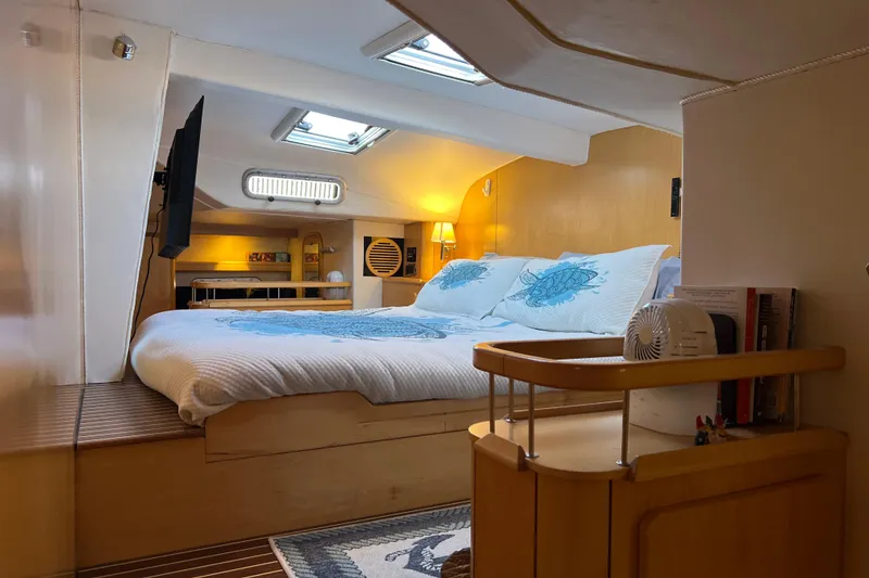 Slide: The Image of Luxurious 2011 Privilege 495 yacht bedroom with skylights and modern decor. - 74