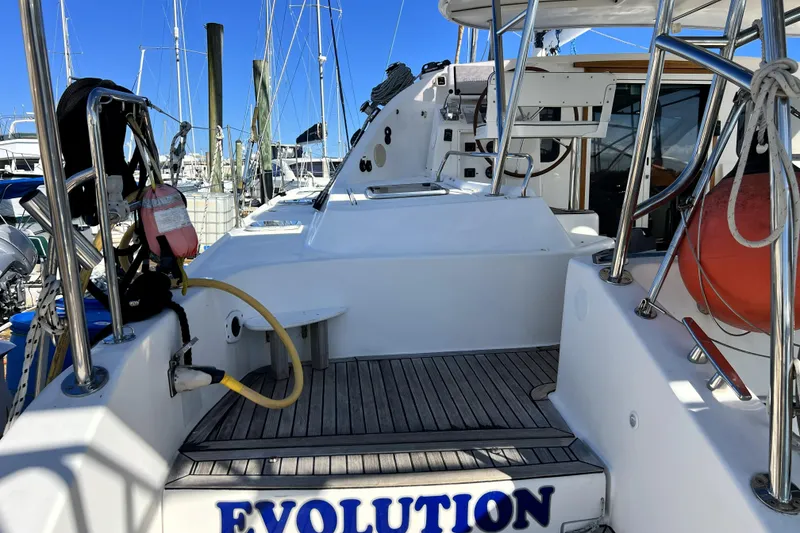 Slide: The Image of Sailing yacht Privilege 495, 2011 model, docked at marina with visible deck and equipment. - 9