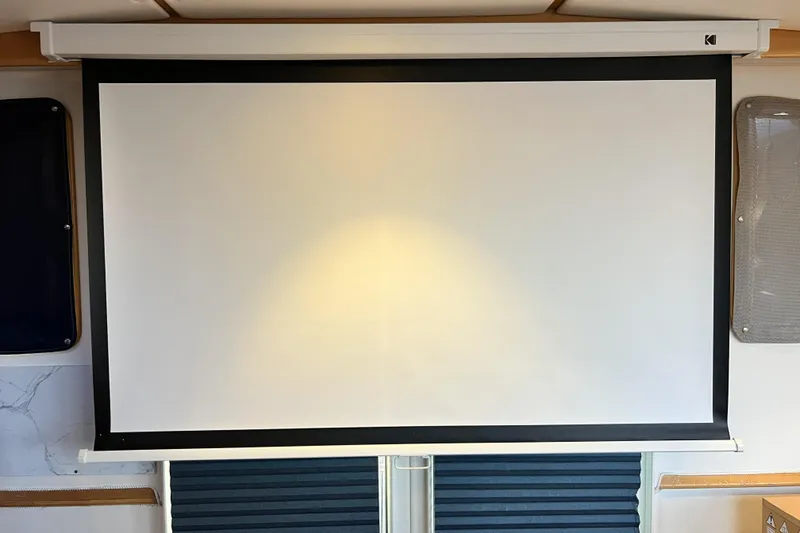 Slide: The Image of Projection screen inside a 2011 Privilege 495 yacht, ready for presentations. - 93
